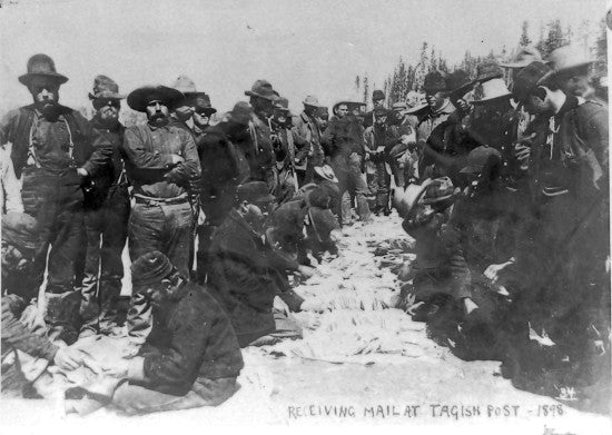Receiving mail at Tagish post, 1898