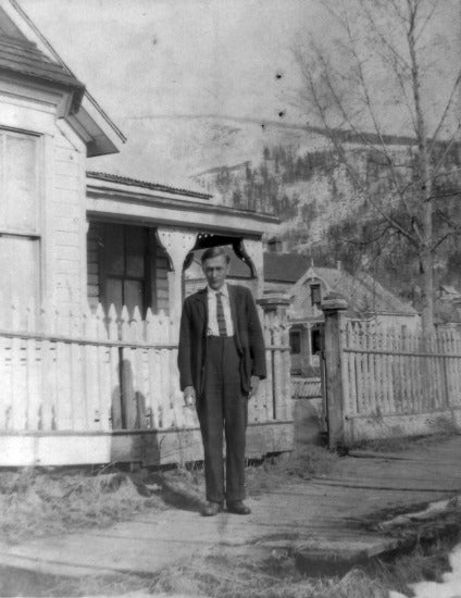 Man at Fifth Avenue and Church Street, Dawson, c1940