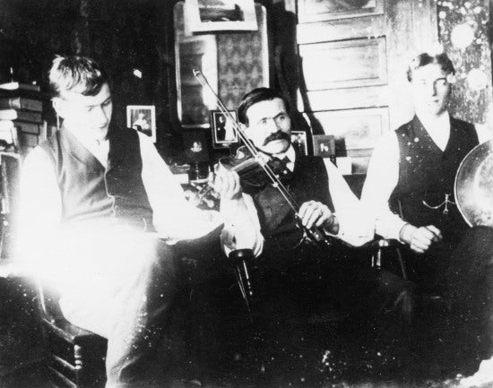Bjorn Svendsen and friends playing music, c1898