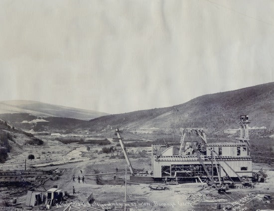 Yukon Gold Co. Building Dredge on 37 below Bonanza Creek, c1910