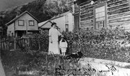 Mrs. Thomas Taylor, Son Desmond and Dog, Dawson City, c1914