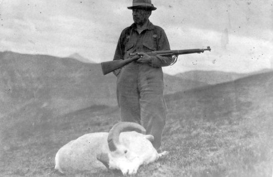 Hunter with Dall Sheep, c1940