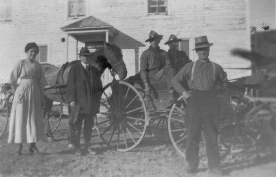 Mrs. Fletcher, Mr. Burrell, Field, Cook & Joe en route to Dawson from Granville, c1918