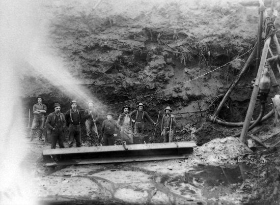 Miners and a Sluice Run, c1910.
