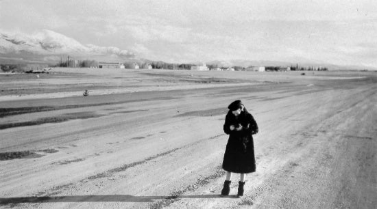Taking a Photograph at the Whitehorse Airport, c1939.