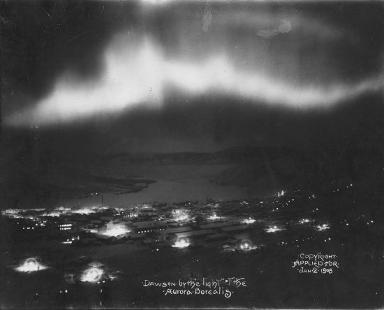 Dawson City by the light of the Aurora Borealis, 1908.