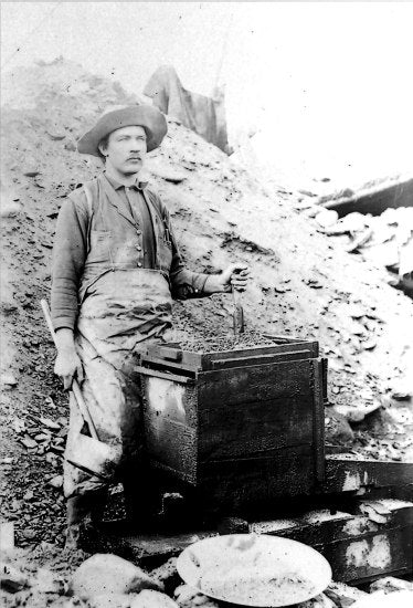 Hand Mining, c1910.