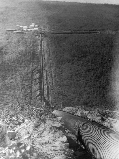 Pure Gold Creek Syphon of the Yukon Ditch System, c1910.