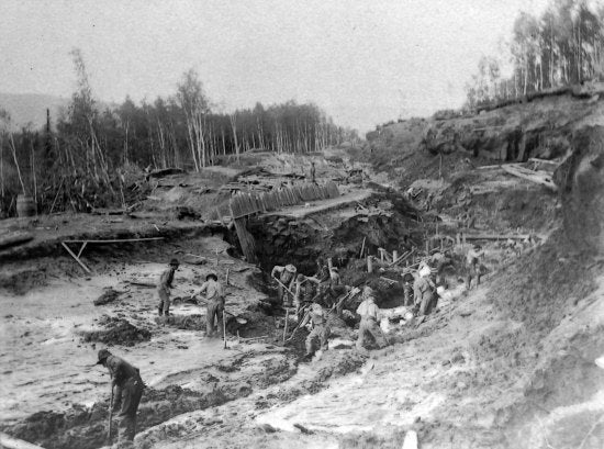 Repairing a Washout on the Yukon Ditch near Quigley Creek, c1910.
