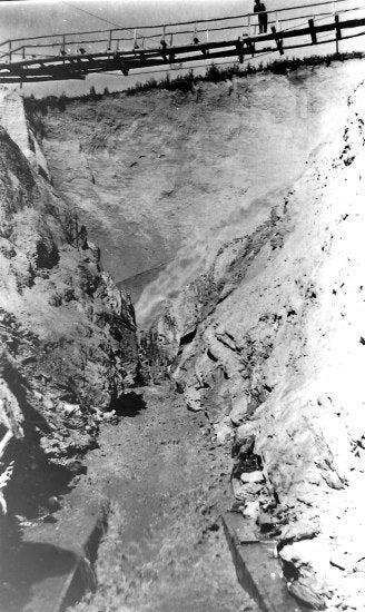 Blasting a Drain through Bedrock, c1910.