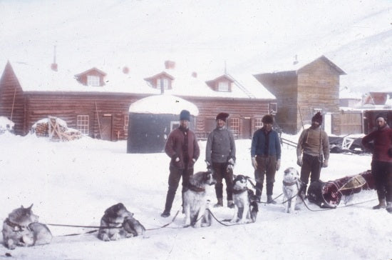 Travelling by Dog Sled, c1920.