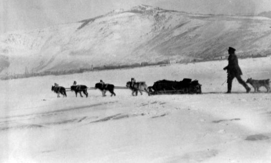 Travelling by Dogsled, c1915.