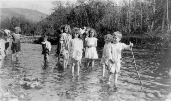 Playing in the River, c1915.