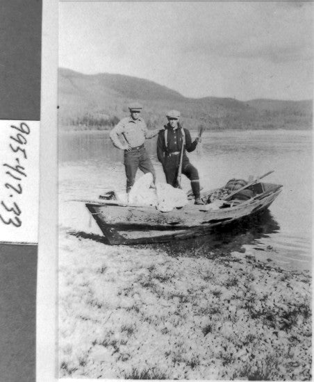 Edwin Renvall and Friend Travelling on the Yukon River, 1930.