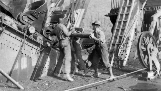 Dredge Crew Replacing Pins in Bucketline, c1937.