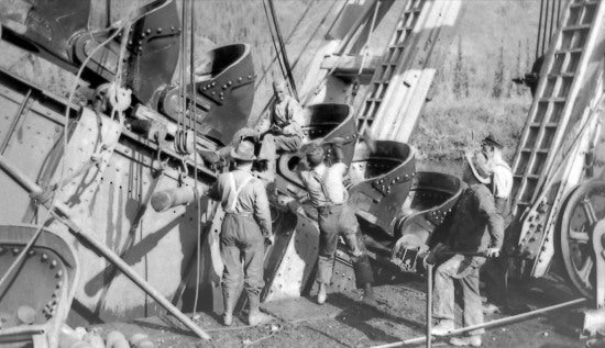 Dredge Crew Hooking up Bucketline, c1937.