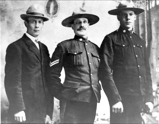 Constable F. Turner, Corporal W.J. Dempster, Constable J.F. Fyfe After their Return Home from the Search for Inspector Fitzgerald and Party, 1911.