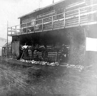 Two Storey Log Cabin, c1900.