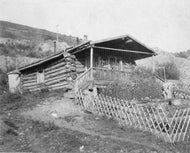 Log Cabin, c1900.