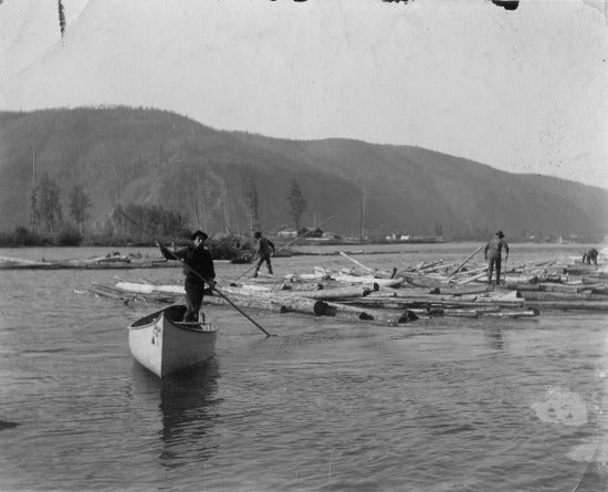 Travelling by Canoe, c1900.