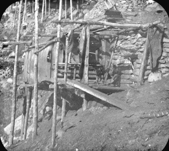 Log Cabin, c1898.