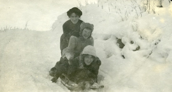 Sledding, c1912.