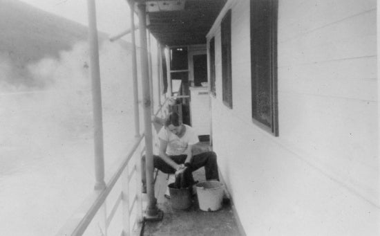 Washing Clothes on Board a Sternwheeler, c1941.