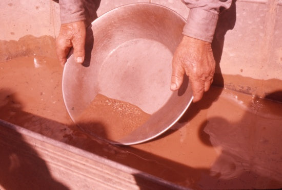 Harry Leamon Demonstrating Gold Panning, c1958.