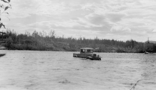 Half-submerged Automobile in the Yukon River, c1935