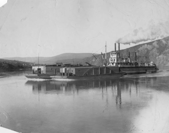 Sternwheeler Pushing Barges, c1910.