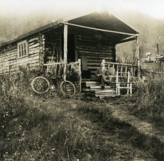 Robert Service at his Cabin c.1909.