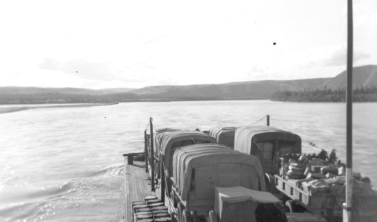 Army vehicles on a barge, 1942