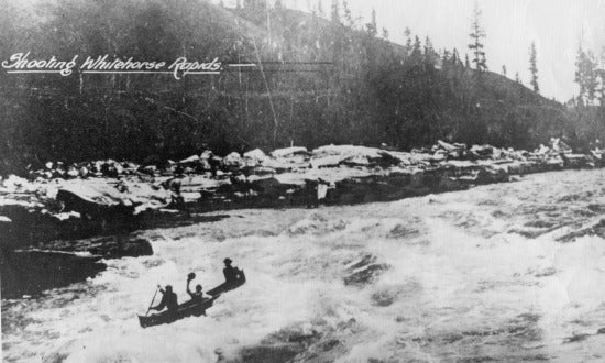 Shooting the Whitehorse Rapids, c1900.