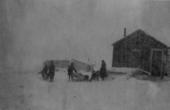 Travelling by Dog Sled, c1921.